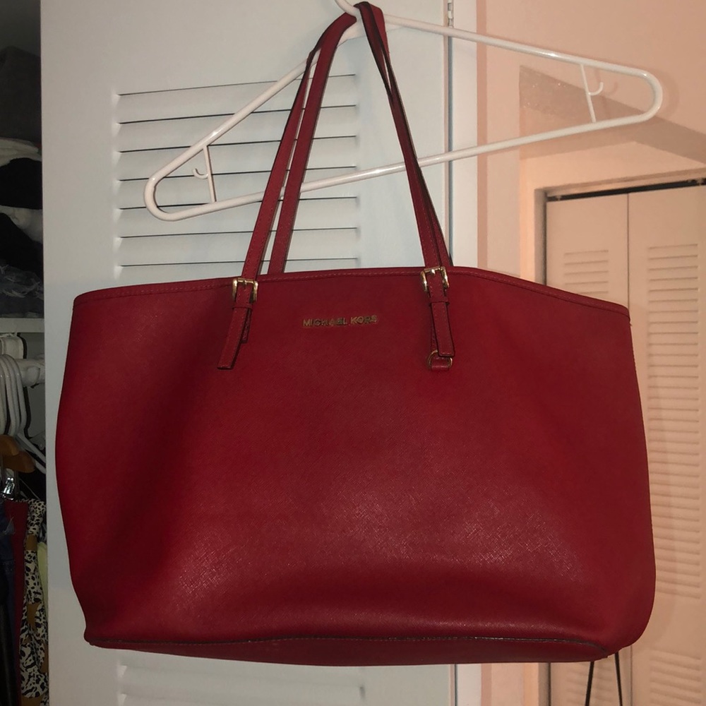 Red Michael Kors handbag